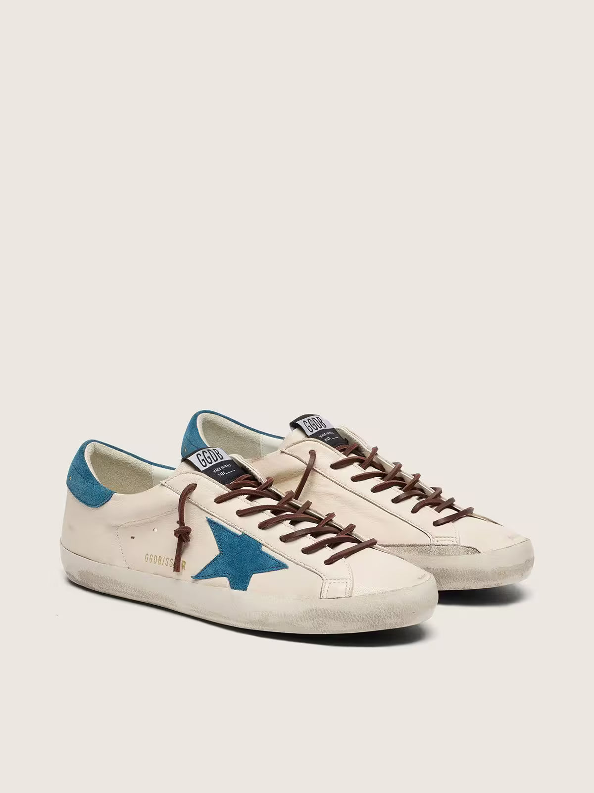 Golden Goose Super-Star white leather sneakers with a turquoise suede star