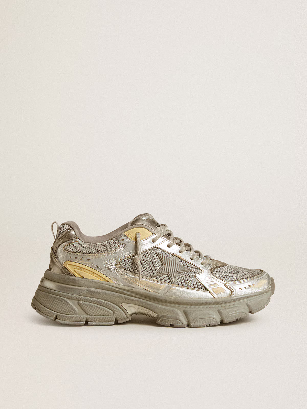 Golden Goose Lightstar sneakers featuring a metallic silver and grey leather