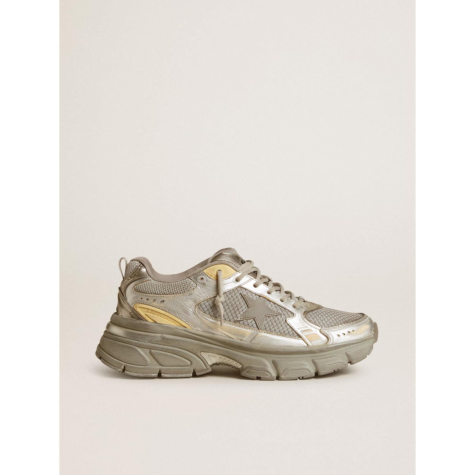Golden Goose Lightstar sneakers featuring a metallic silver and grey leather