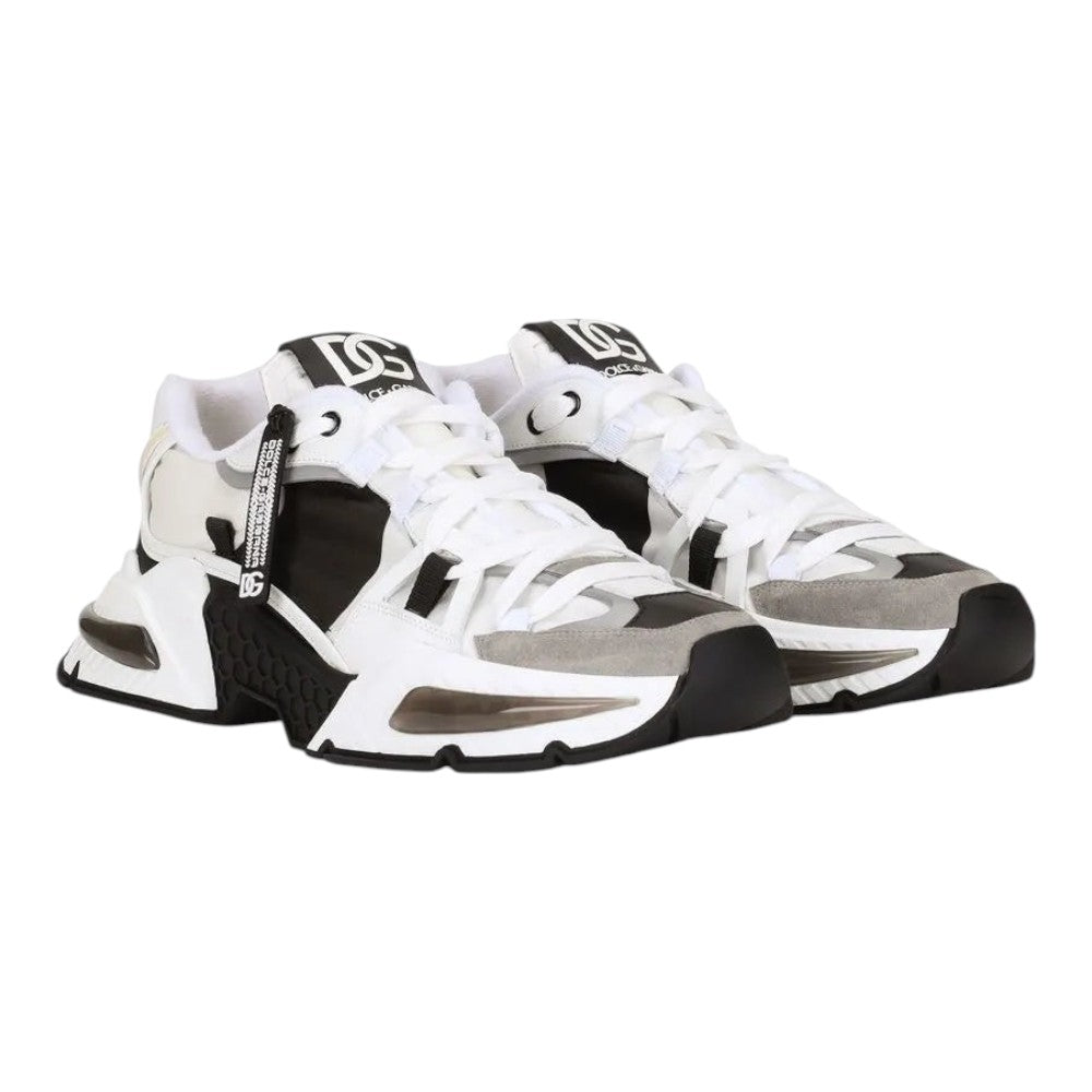 Luxurykicks.store Dolce & Gabbana Airmaster panelled sneakers in white, black, and grey with chunky rubber soles.