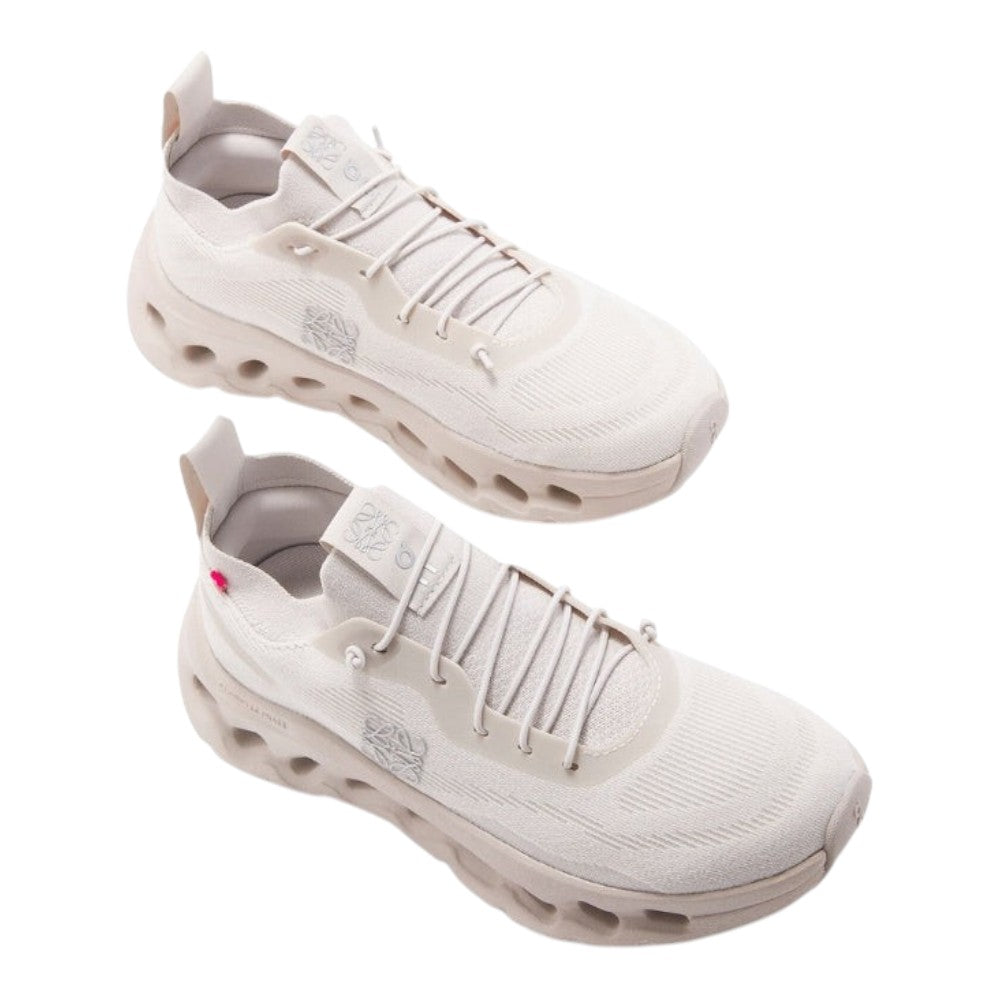 Luxurykicks.store Loewe x On Running Cloudtilt sneakers in sand beige with a modern mesh upper and cushioned sole.
