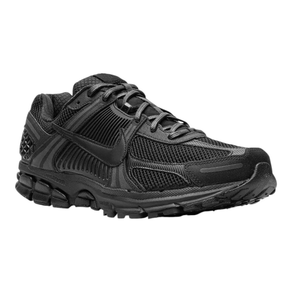 Luxurykicks.store Nike Zoom Vomero 5 Triple Black sneakers featuring breathable mesh and supportive overlays.