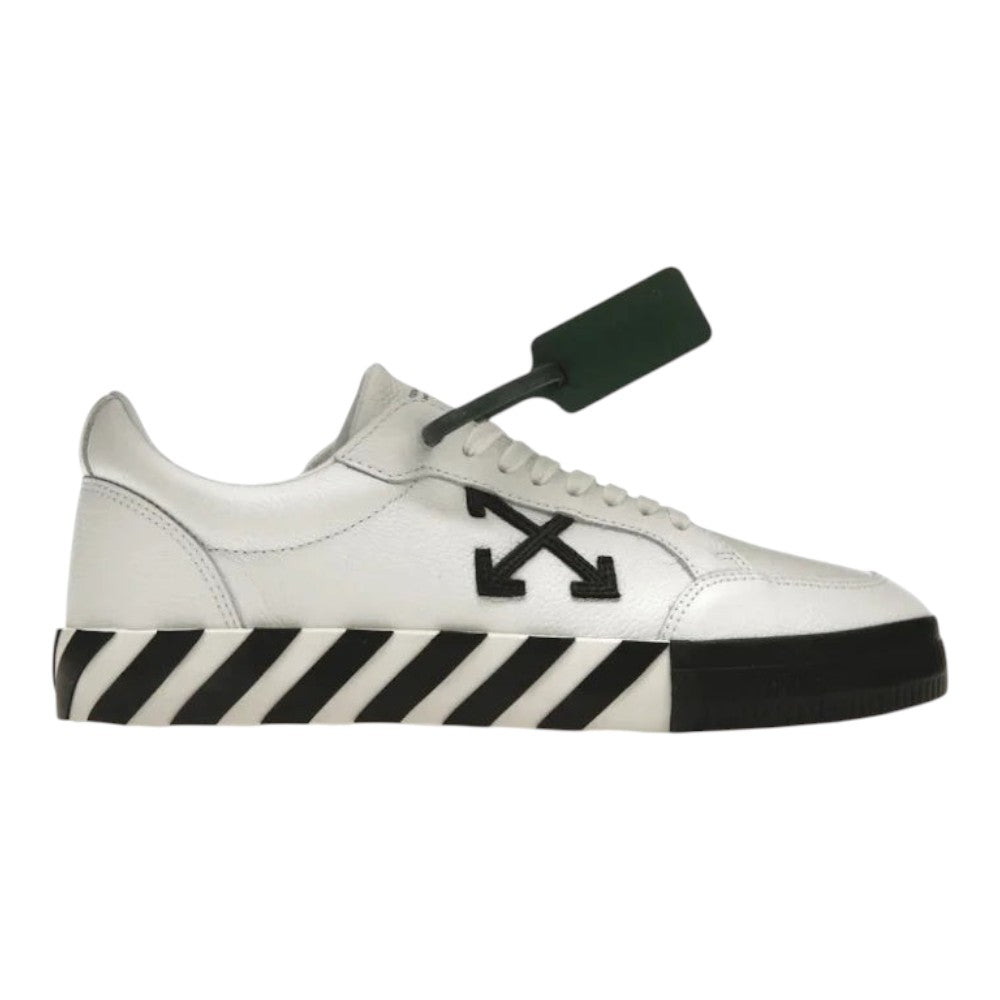 Luxurykicks.store OFF-WHITE Vulc low leather sneaker in white with black arrow logo and striped rubber sole