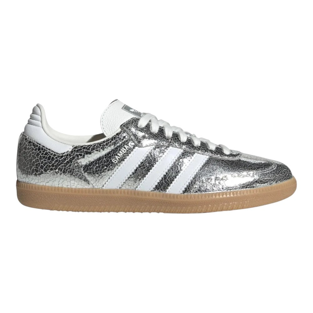 Luxurykicks.store women's Samba OG sneakers in metallic silver leather with white stripes and a gum rubber sole.