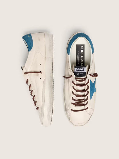 Golden Goose Super-Star white leather sneakers with a turquoise suede star