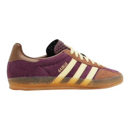 Luxurykicks.store adidas Gazelle Indoor sneaker in maroon suede with brown leather stripes and a gum rubber outsole.