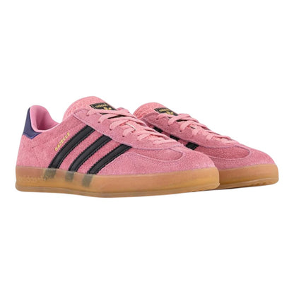 Luxurykicks.store Adidas Gazelle Indoor women's sneakers in bliss pink suede with black stripes and gum rubber sole.