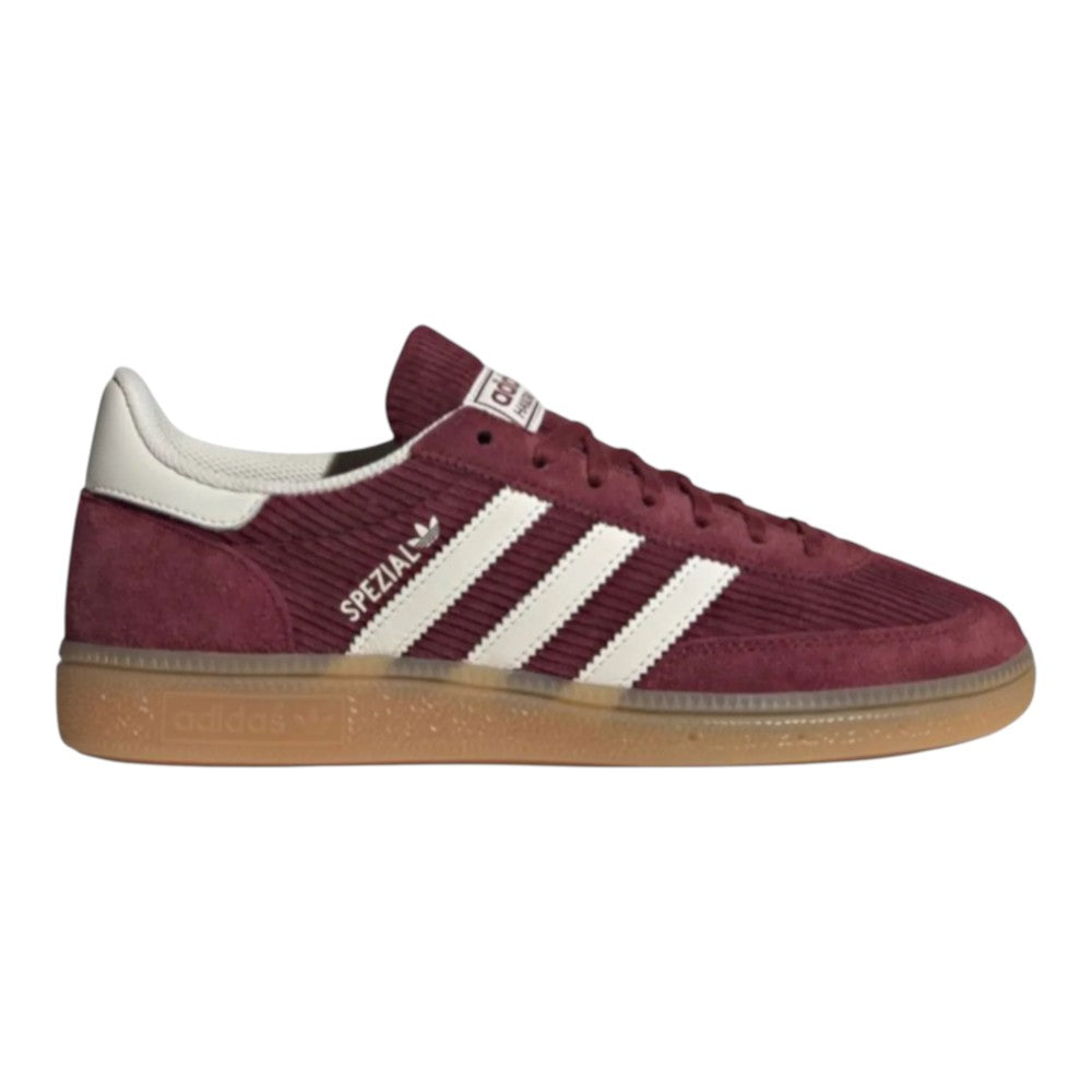 Luxurykicks.store adidas Wmns Handball Spezial in shadow red corduroy with white stripes and gum rubber outsole.
