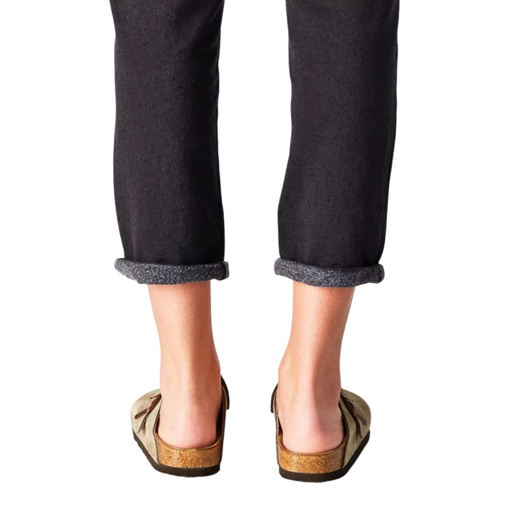 Luxurykicks.store Birkenstock Boston clogs in taupe suede with cork footbeds worn with black cuffed trousers