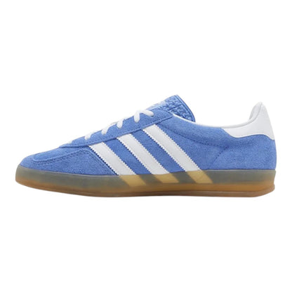 Luxurykicks.store adidas Wmns Gazelle Indoor sneakers in blue suede with white stripes and a gum rubber sole.