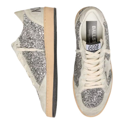 Luxurykicks.store Golden Goose Ball Star sneakers in silver glitter and ice-gray suede with distressed detailing.