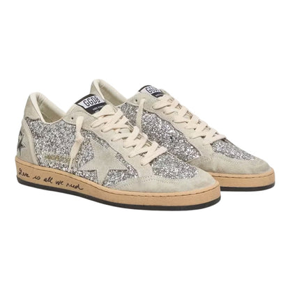 Luxurykicks.store Golden Goose Ball Star sneakers in silver glitter and ice-gray suede with distressed detailing.