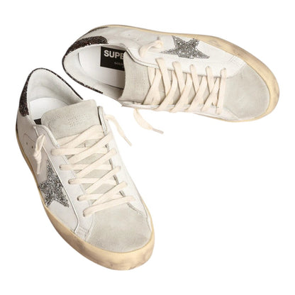 Luxurykicks.store Golden Goose Super-Star sneakers in white leather with a silver star and brown glitter heel tab