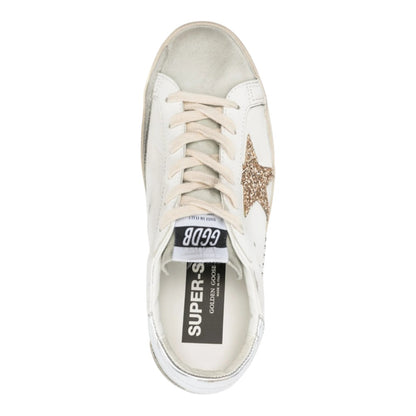 Luxurykicks.store Golden Goose Superstar low-top sneakers in white leather with gold glitter star and silver accents