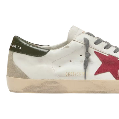 Luxurykicks.store Golden Goose Super-Star sneaker in white leather with a red suede star and olive green heel tab.