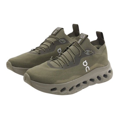 Luxurykicks.store Loewe x On Running Cloudtilt sneakers in khaki green with a lightweight mesh upper and thick sole.