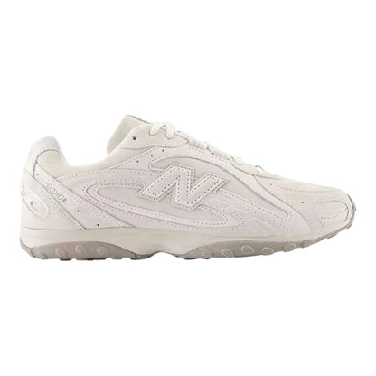 Luxurykicks.store New Balance 204L Timberwolf sneakers in a neutral off-white tone with premium leather construction.