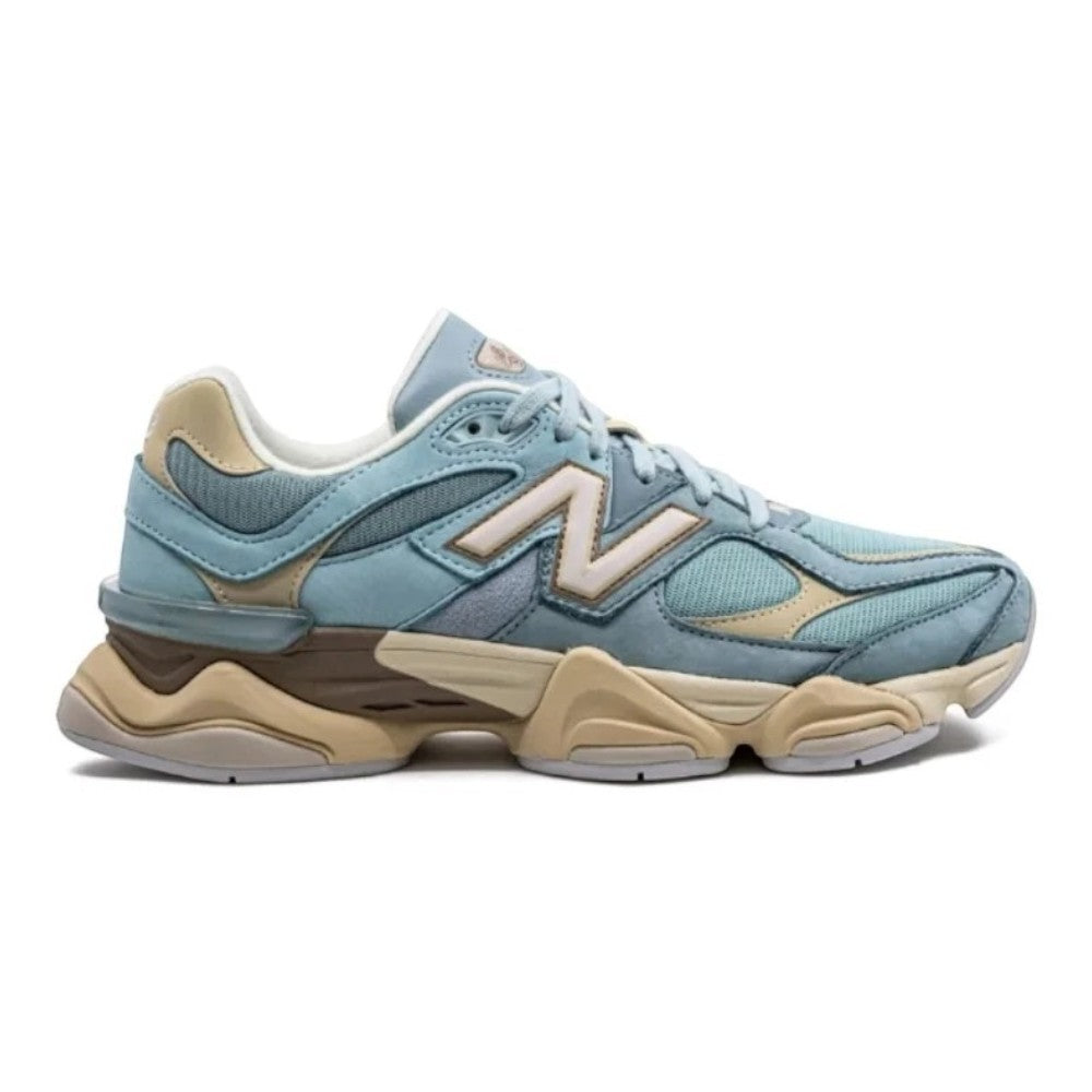 Luxurykicks.store New Balance 9060 Blue Haze sneaker with mesh upper, synthetic overlays, and chunky cream midsole.