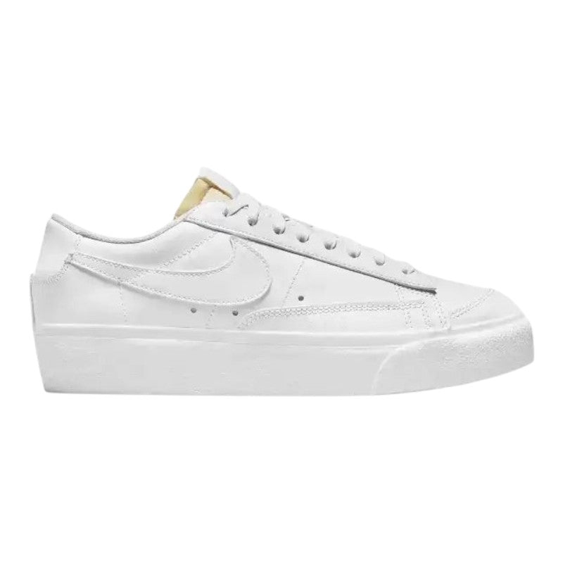 Luxurykicks.store Nike Blazer Low Platform sneaker in triple white leather with a thick platform sole and side swoosh.