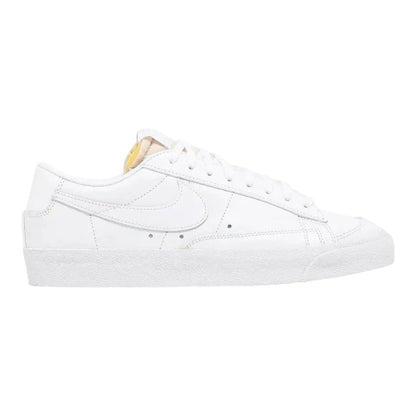 Luxurykicks.store Nike Blazer Low '77 in triple white leather with a low-profile design and classic rubber outsole.