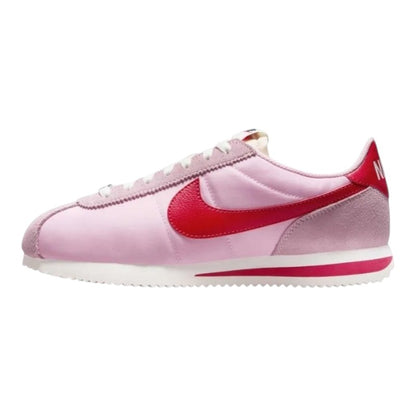 Luxurykicks.store Nike Cortez trainers in soft pink and fire red with sail accents and suede detailing