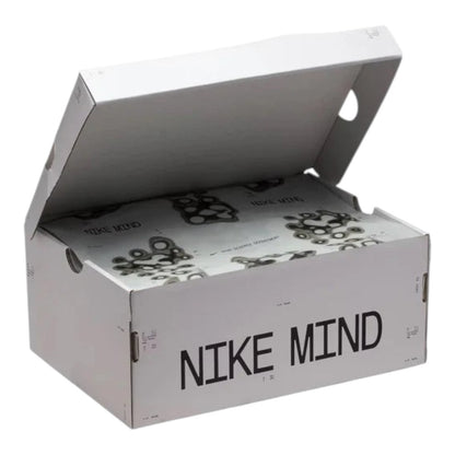 Luxurykicks.store Nike Mind 001 sneaker box in white with black branding and patterned tissue paper inside