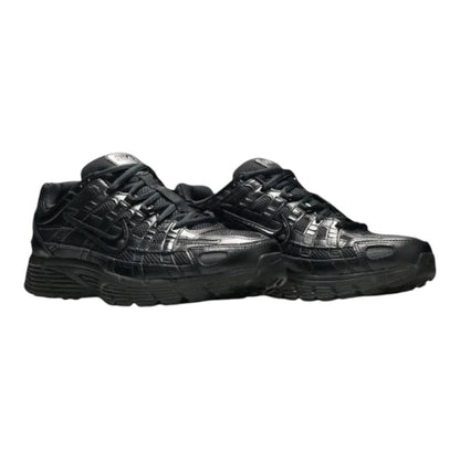 Luxurykicks.store Nike P-6000 Premium sneakers in triple black featuring a layered mesh and synthetic upper.
