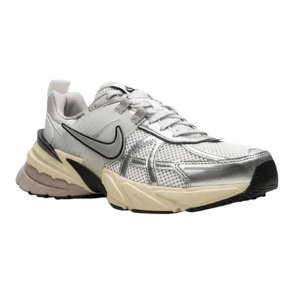 Luxurykicks.store Nike V2K Run sneakers in metallic silver with mesh and synthetic leather panels on a chunky sole.