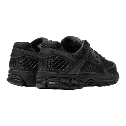 Luxurykicks.store Nike Zoom Vomero 5 Triple Black sneakers featuring breathable mesh and textured heel overlays