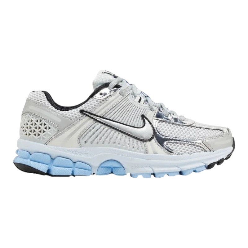 Luxurykicks.store Nike Zoom Vomero 5 running shoe in metallic silver and white mesh with light blue midsole accents.