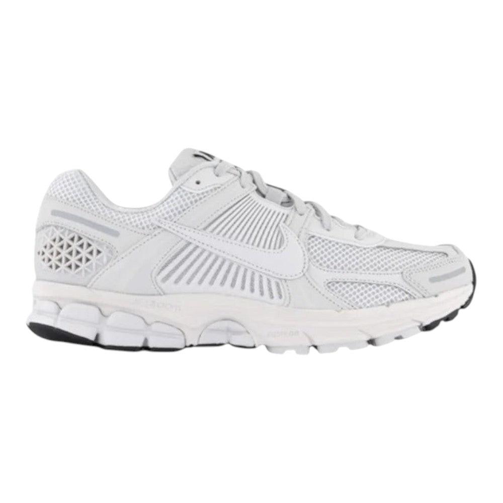 Luxurykicks.store Nike Zoom Vomero 5 in white and vast grey with breathable mesh upper and Zoom Air cushioning.