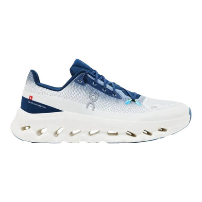 Luxurykicks.store On Running Cloudtilt Ivory Tempest sneaker with white mesh upper, blue accents, and cushioned sole.