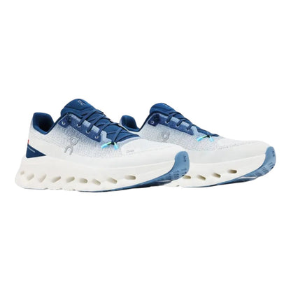 Luxurykicks.store On Running Cloudtilt Ivory Tempest sneakers featuring white mesh, blue accents, and cushioned soles.