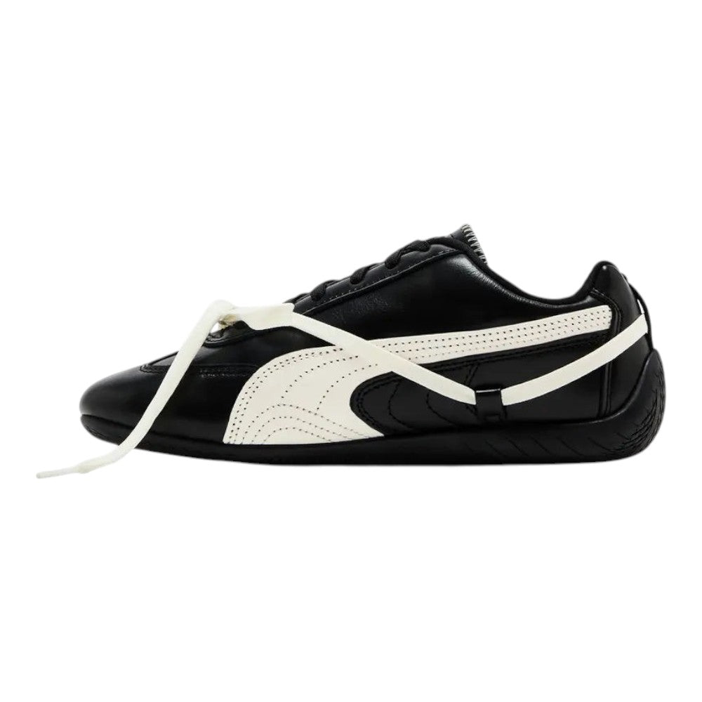 Luxurykicks.store Rosé x Puma Wmns Speedcat Premium sneaker in black leather with white side stripe and racing design.
