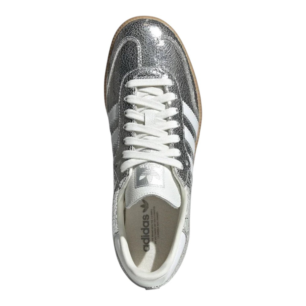 Luxurykicks.store Samba OG women's sneakers in silver metallic leather with white laces and a gum rubber sole.