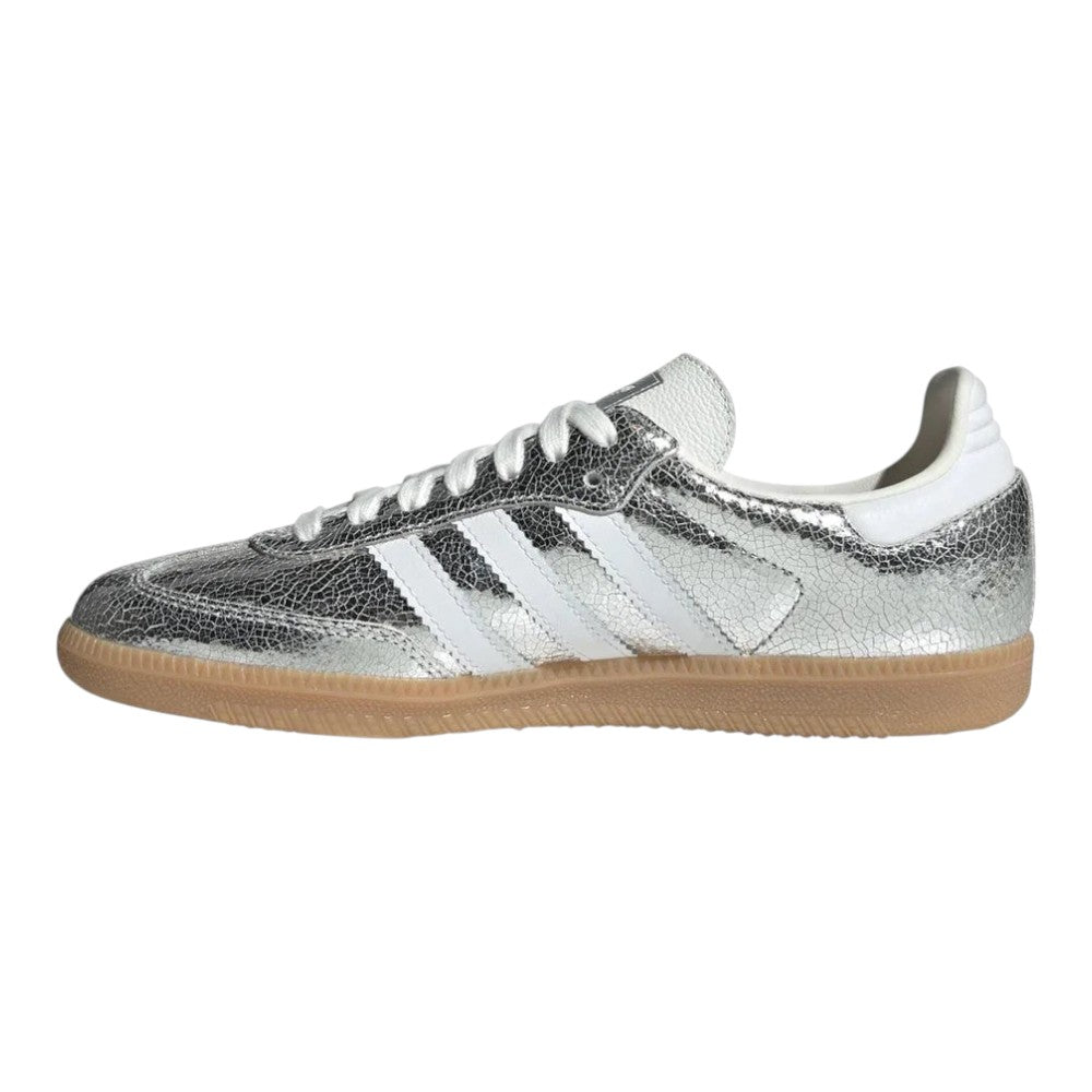Luxurykicks.store Samba OG women's sneakers in silver metallic leather with white stripes and a gum rubber sole.