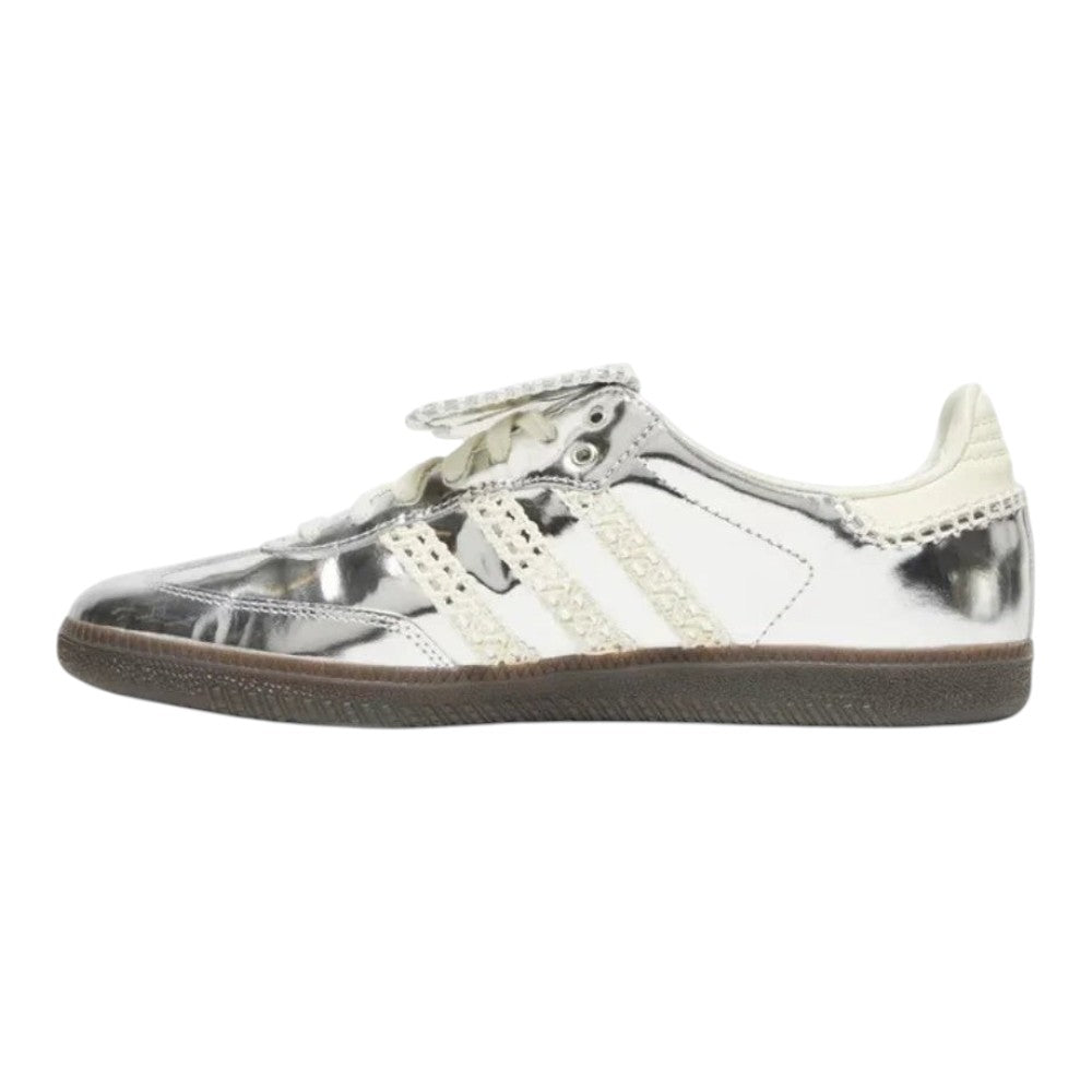 Luxurykicks.store Wales Bonner x Samba sneakers in metallic silver with signature crochet-style side stripes.