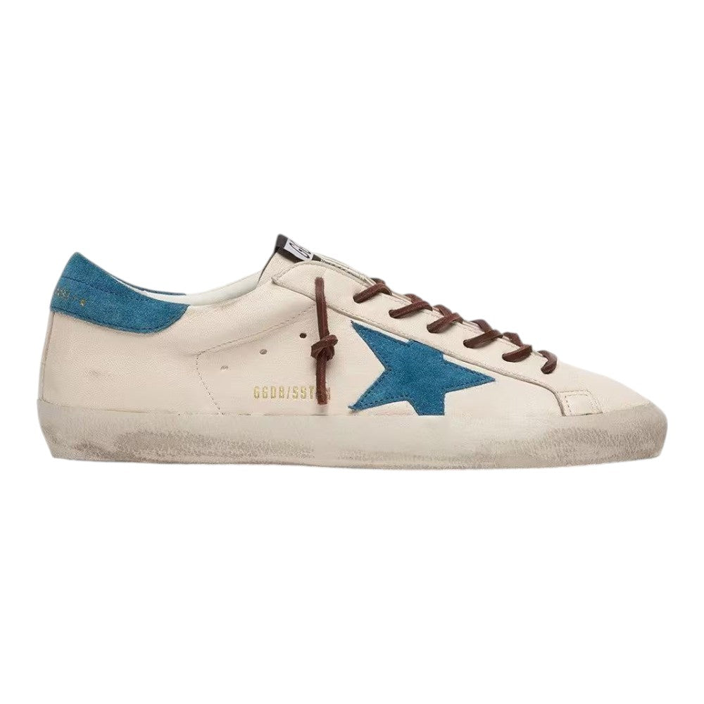 Luxurykicks.store Golden Goose Super-Star white leather sneakers with a turquoise suede star and distressed finish.
