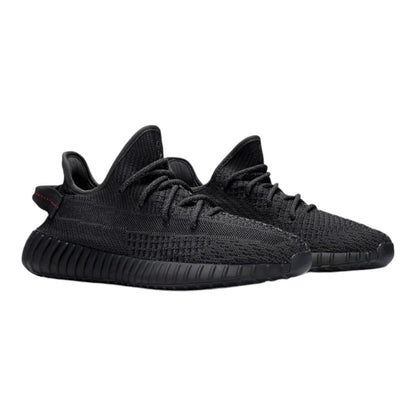 Luxurykicks.store Adidas Yeezy Boost 350 V2 Black Non-Reflective sneakers with Primeknit upper and Boost cushioning.