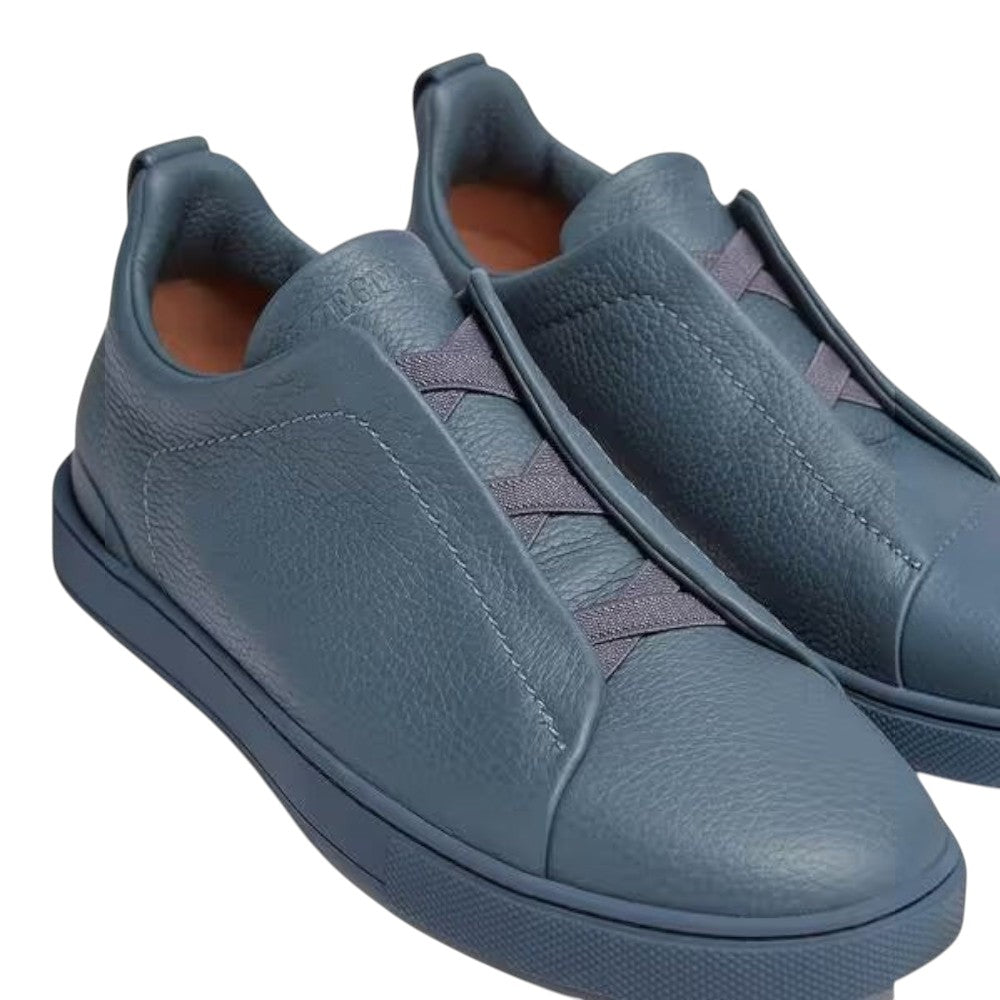 Luxurykicks.store Zegna Triple Stitch sneakers in avio blue full-grain leather with signature elastic cross-stitching.
