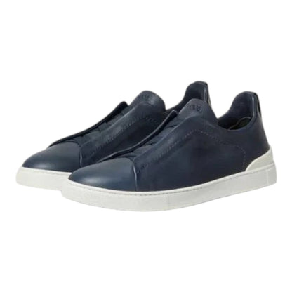Luxurykicks.store Zegna Triple Stitch SECONDSKIN blue leather sneakers with signature triple-stitching detail.