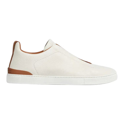 Luxurykicks.store Zegna Triple Stitch low-top sneakers in white leather with brown accents and signature detailing.
